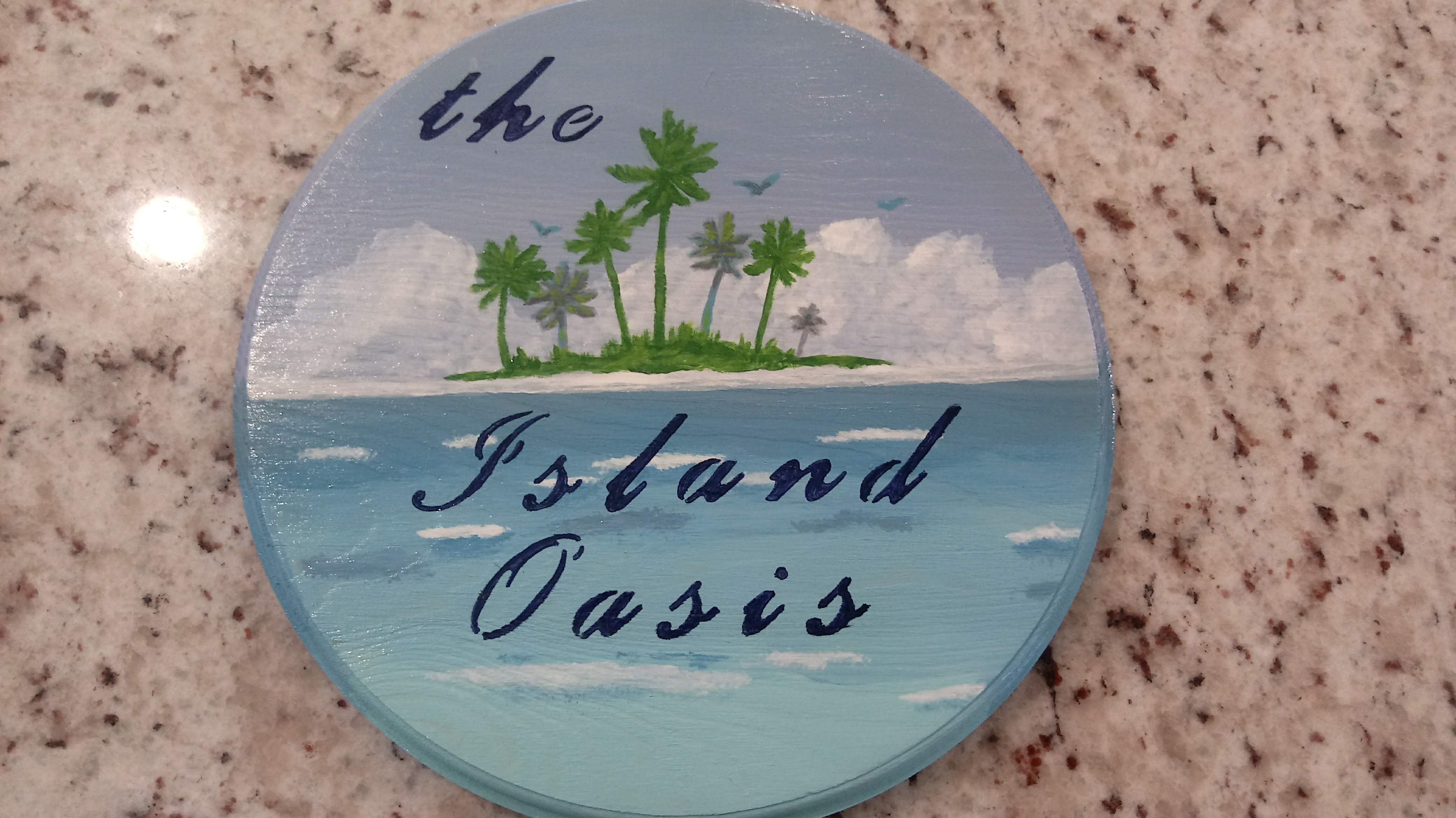 The Island Oasis — hand-painted round plaque with palm trees