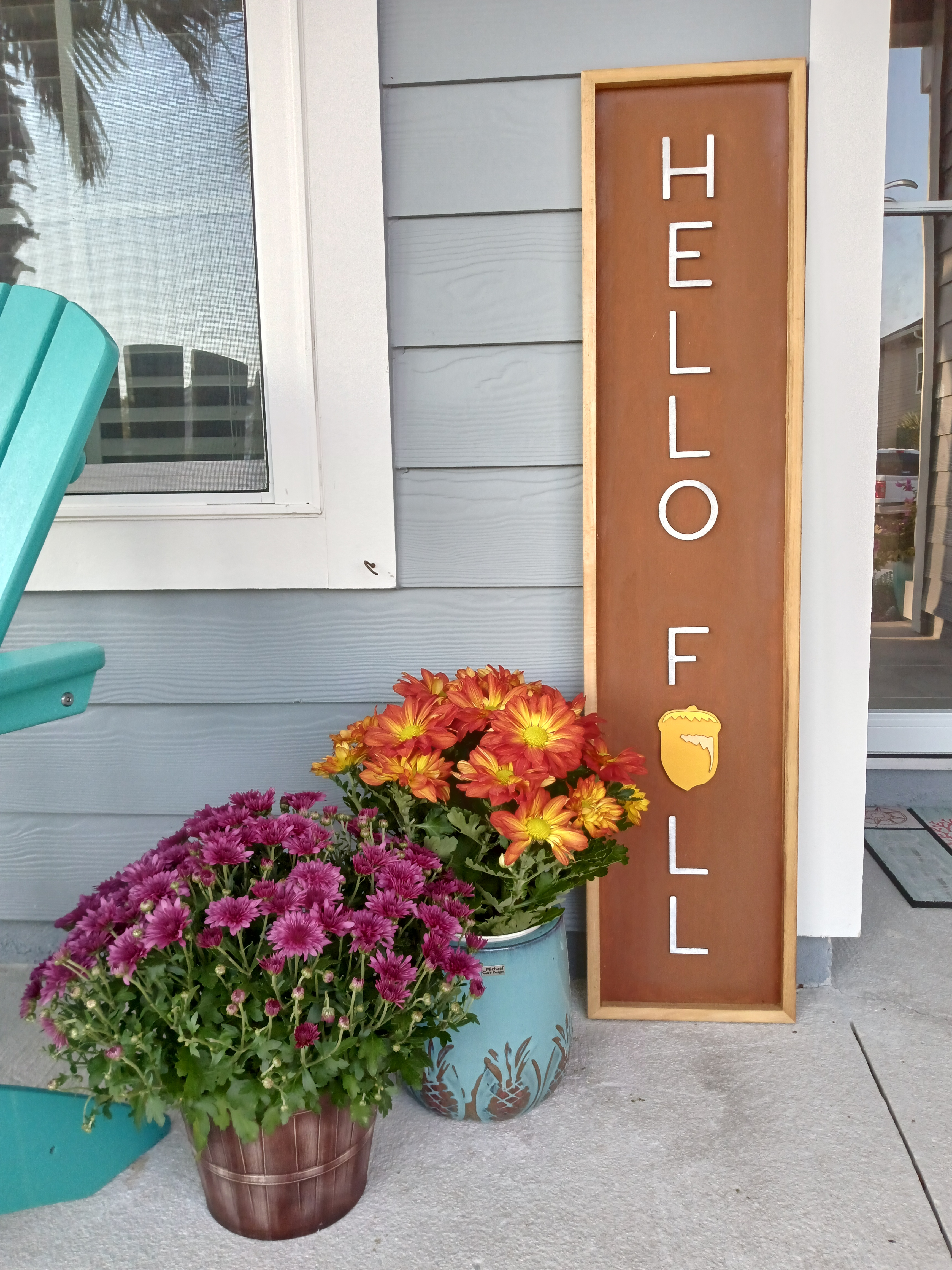 Hello Fall porch sign with colorful mums